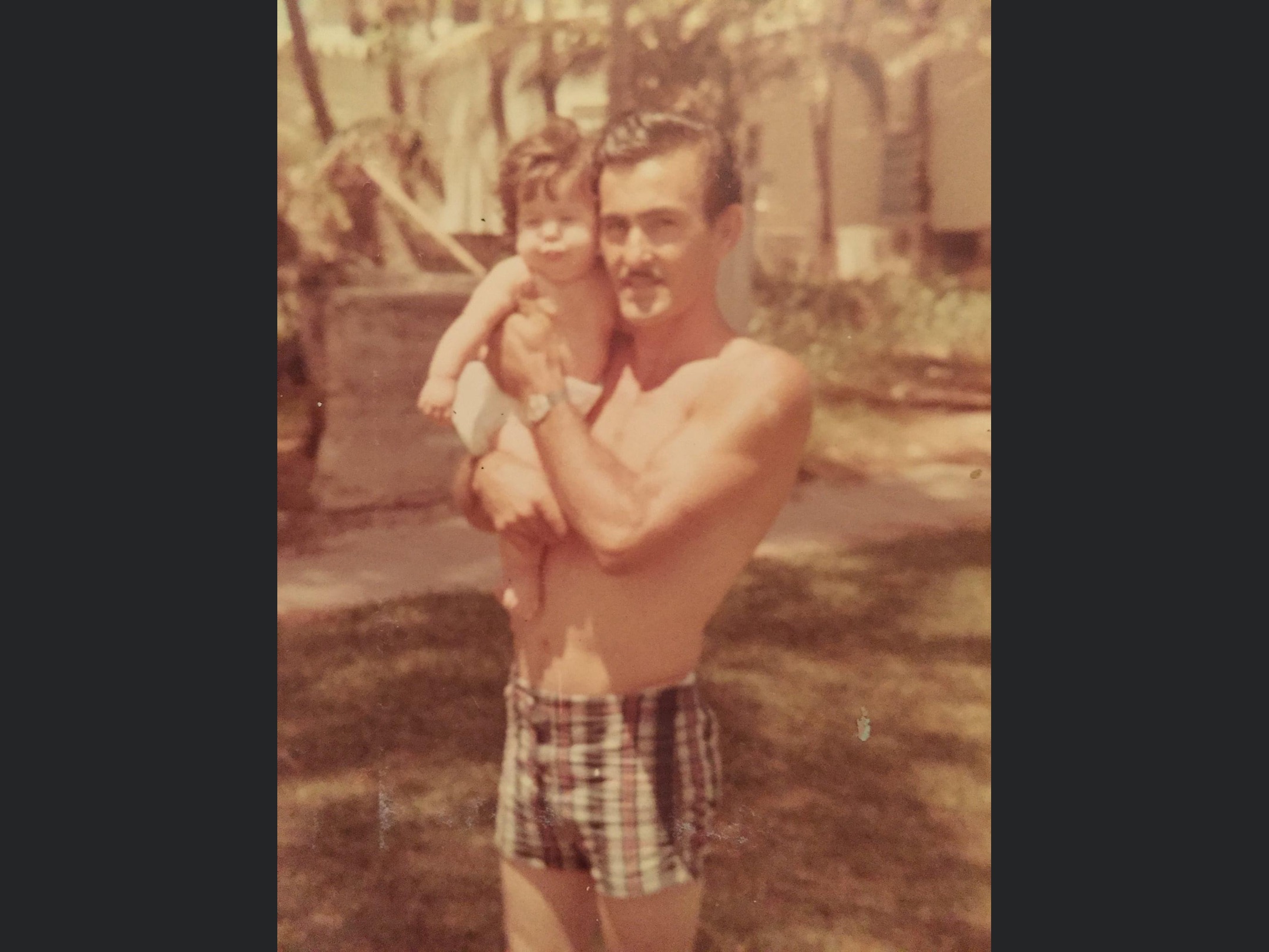 Oscar Rodriguez and one of his 4 daughters; Maylen — Key West, Florida USA 1967