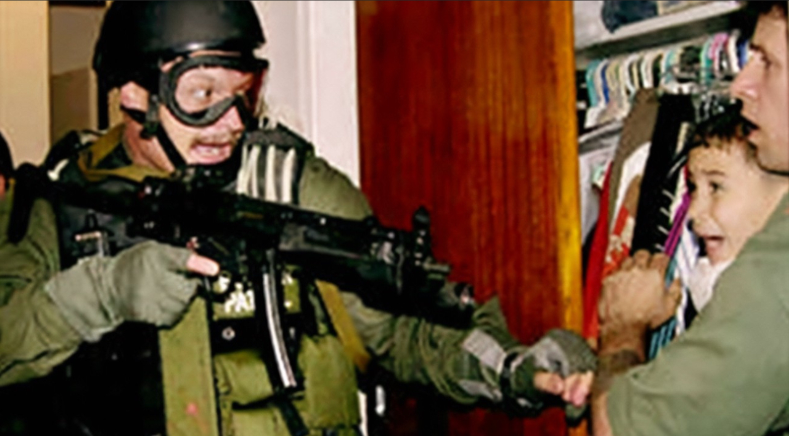 US Marshals taking then 6 year old, Elian Gonzalez from his maternal family’s home in Little Havana, Florida 